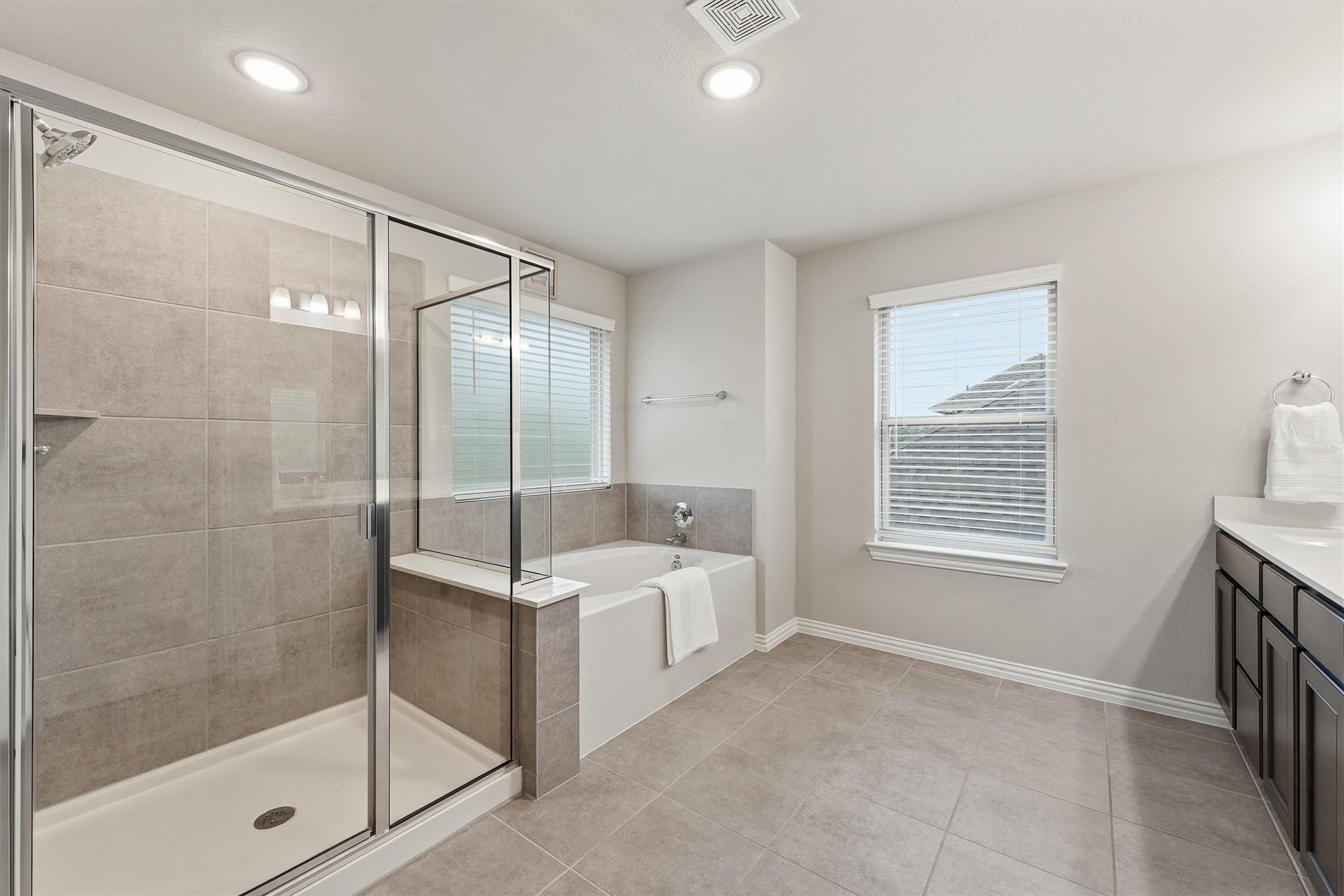 7119 Mystic Morning Lane Spring, TX 77379 - Photo 20 of 30 a bathroom with a sink a toilet and shower