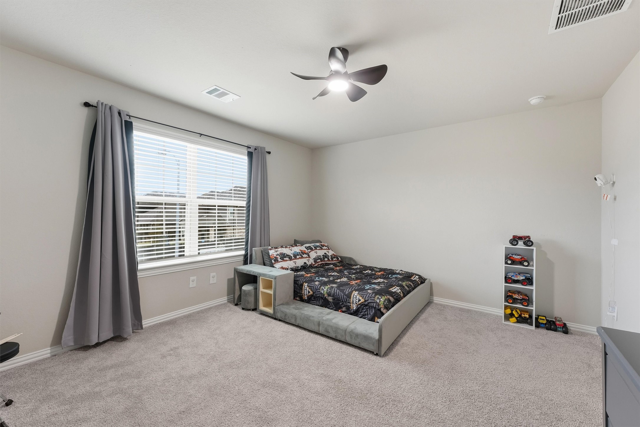 7119 Mystic Morning Lane Spring, TX 77379 - Photo 22 of 30 a living room with furniture and a window