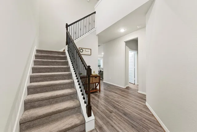 a view of entryway with wooden floor