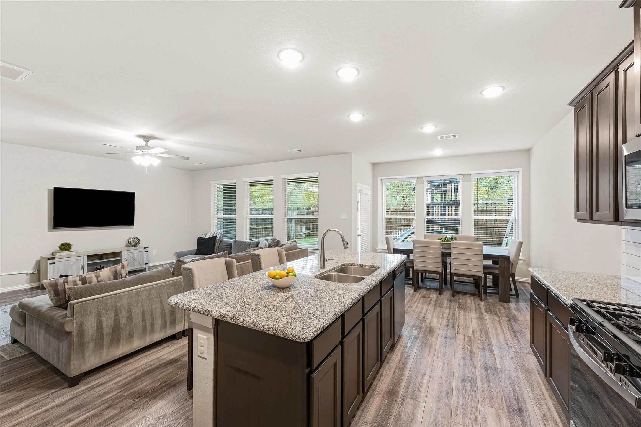 7119 Mystic Morning Lane Spring, TX 77379 - Photo 8 of 30 a living room with furniture and a flat screen tv