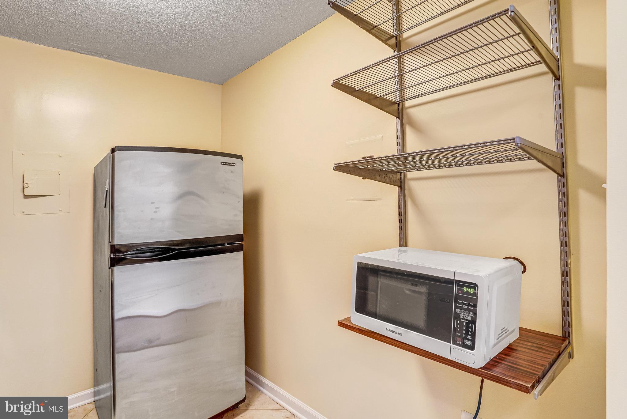 1301 20th Street Northwest, Unit 501 Washington, DC 20036 - Photo 13 of 19 a view of a fireplace in a room