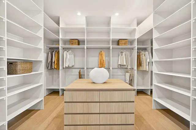 a bathroom with a sink and a window