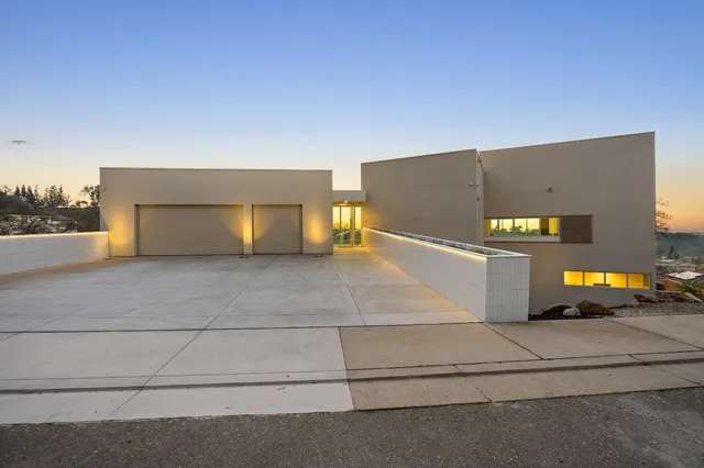 a view of a dinning tables and chairs in the patio