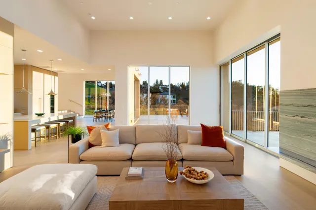 a balcony with furniture and a swing