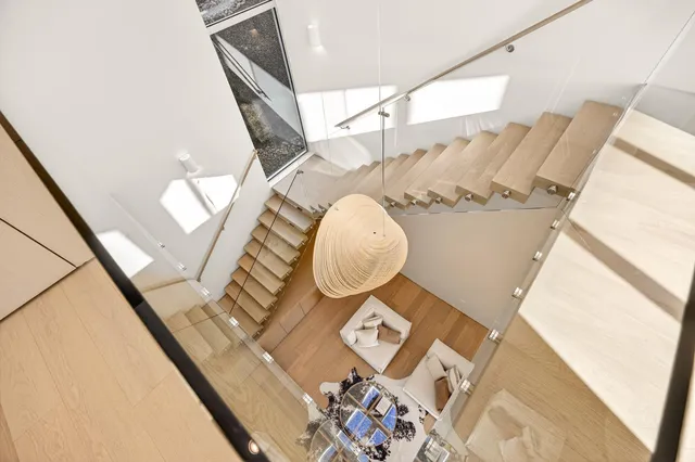 an aerial view of a house with a garden