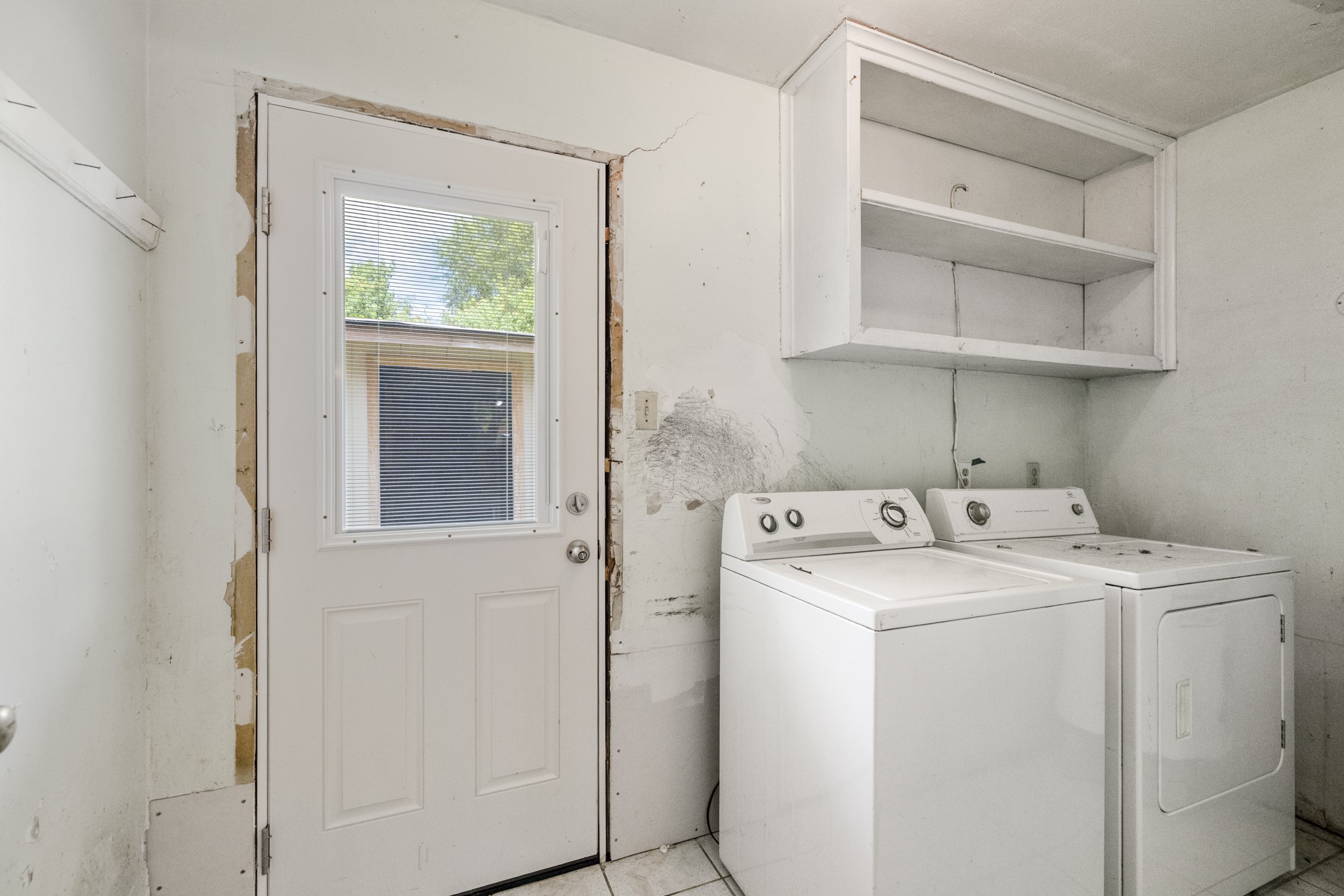 140 Friar Tuck Road Shepherd, TX 77371 - Photo 14 of 38 a view of storage and utility room with washer and dryer
