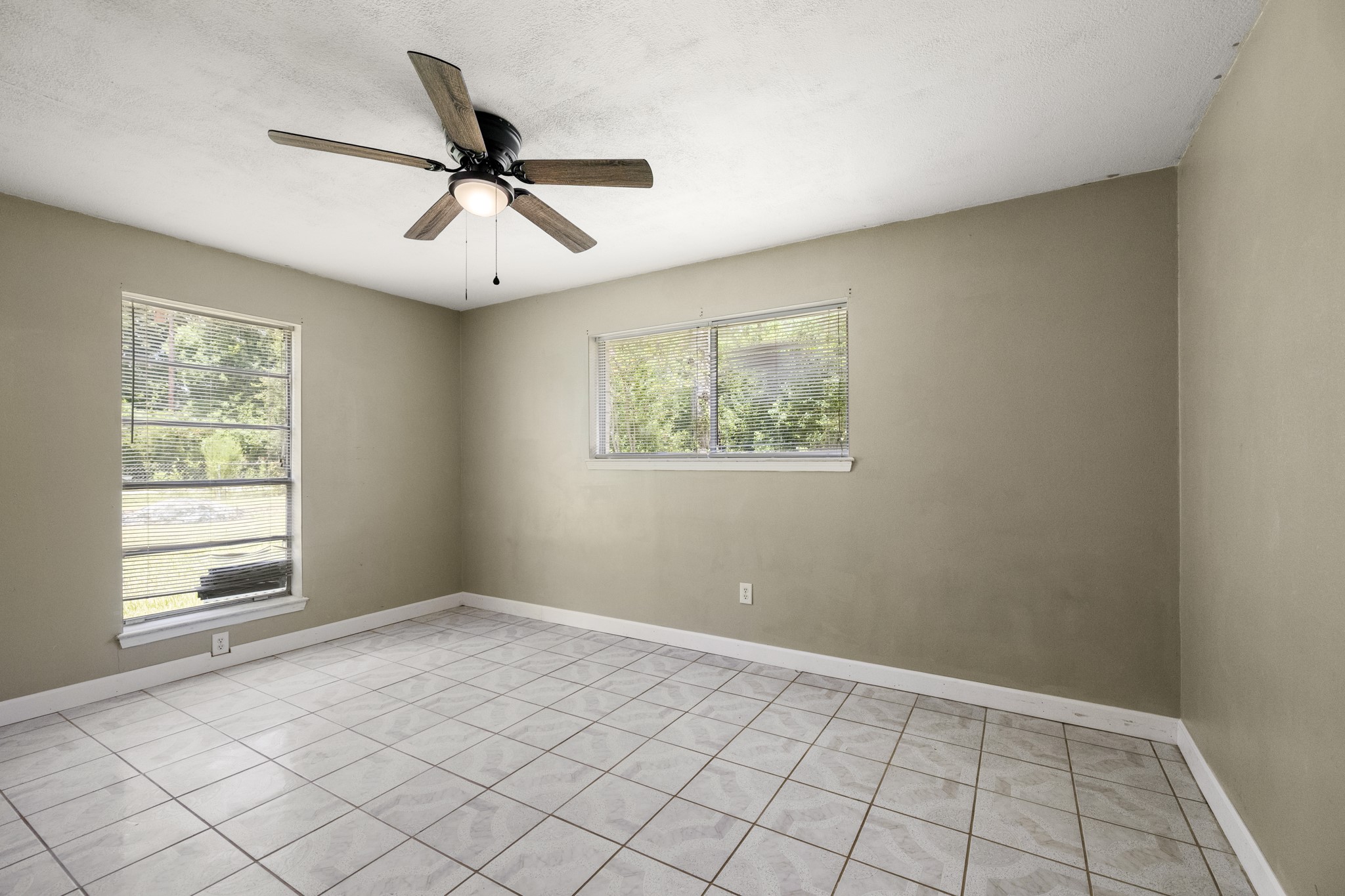 140 Friar Tuck Road Shepherd, TX 77371 - Photo 15 of 38 a view of an empty room with a window