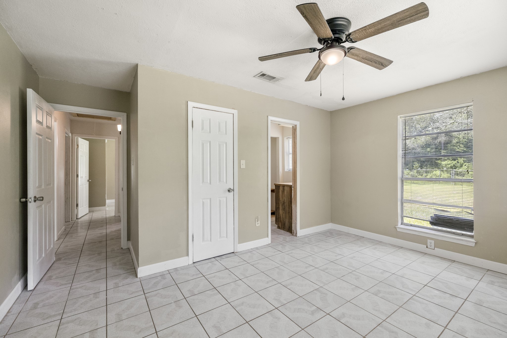 140 Friar Tuck Road Shepherd, TX 77371 - Photo 16 of 38 a view of an empty room and window