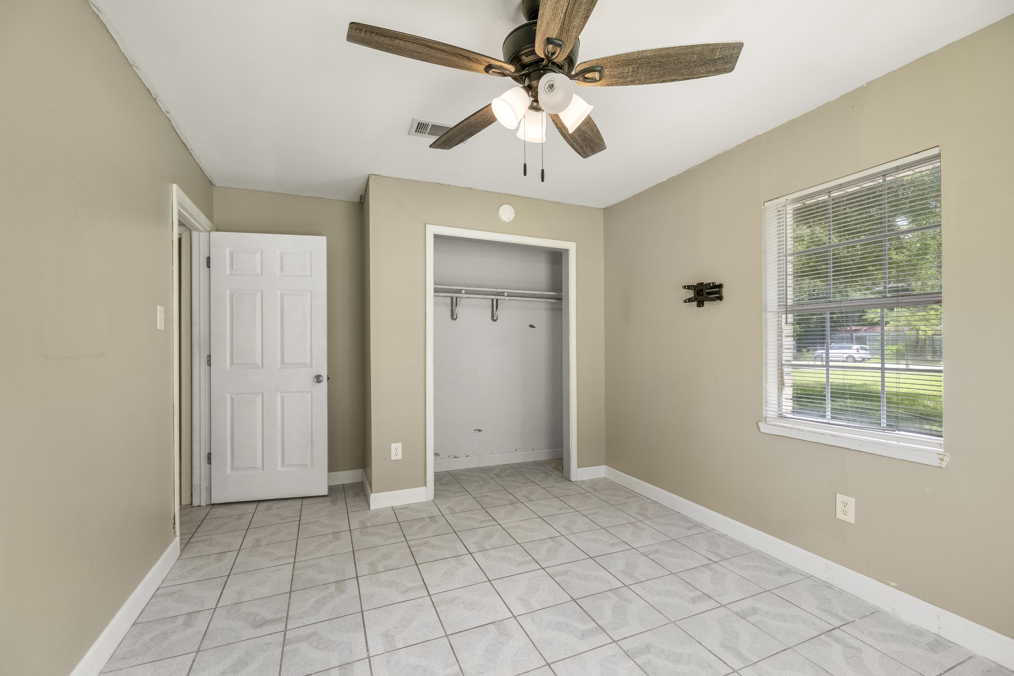 140 Friar Tuck Road Shepherd, TX 77371 - Photo 23 of 38 a view of an empty room with a window