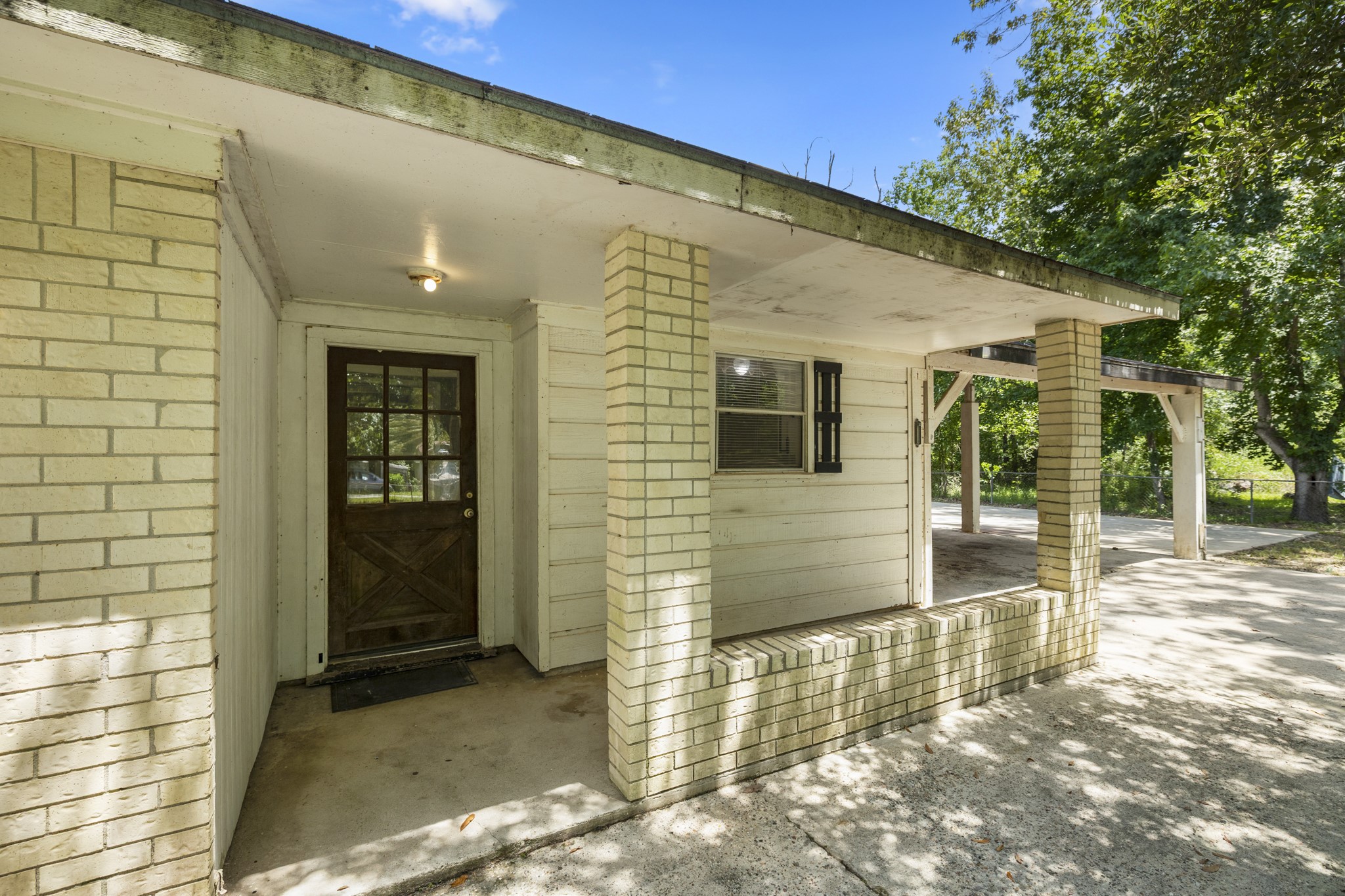 140 Friar Tuck Road Shepherd, TX 77371 - Photo 4 of 38 a view of a back yard of the building