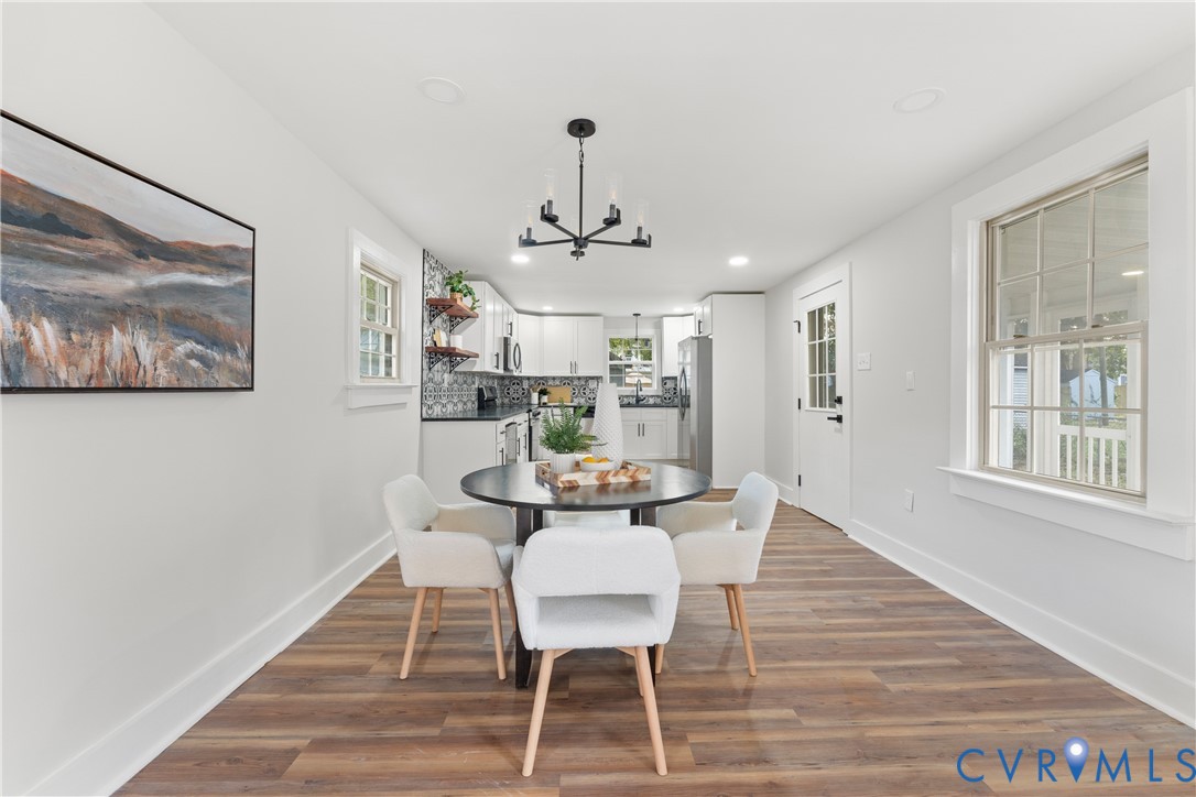 428 3rd Street West Point, VA 23181 - Photo 23 of 49 a view of a dining room with furniture window and wooden floor