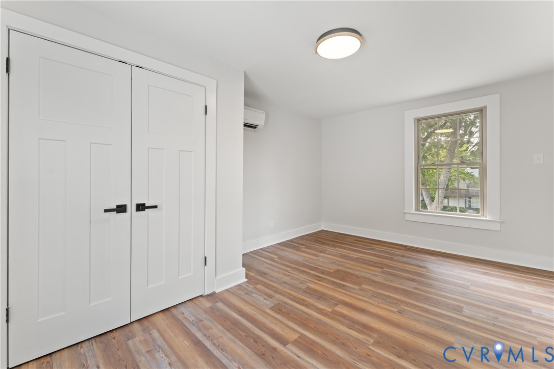 428 3rd Street West Point, VA 23181 - Photo 35 of 49 a view of a room with wooden floor and window
