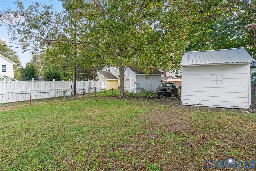428 3rd Street West Point, VA 23181 - Photo 42 of 49 a view of a backyard with a garden and entertaining space