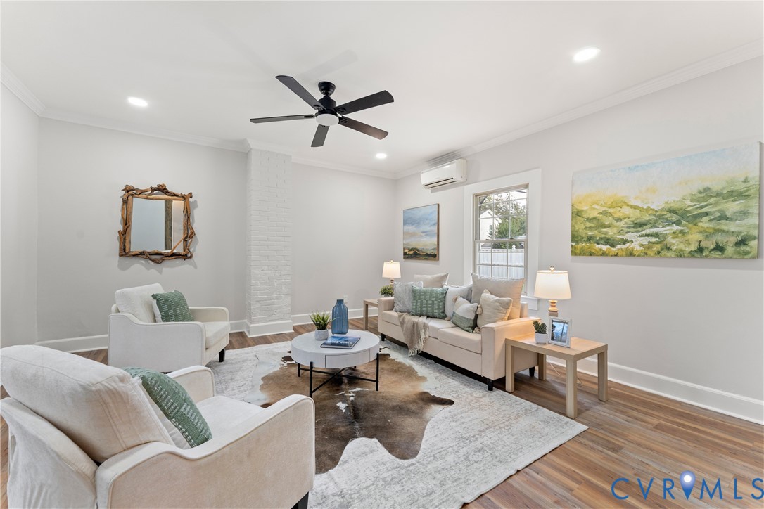 428 3rd Street West Point, VA 23181 - Photo 6 of 49 a living room with furniture and a window