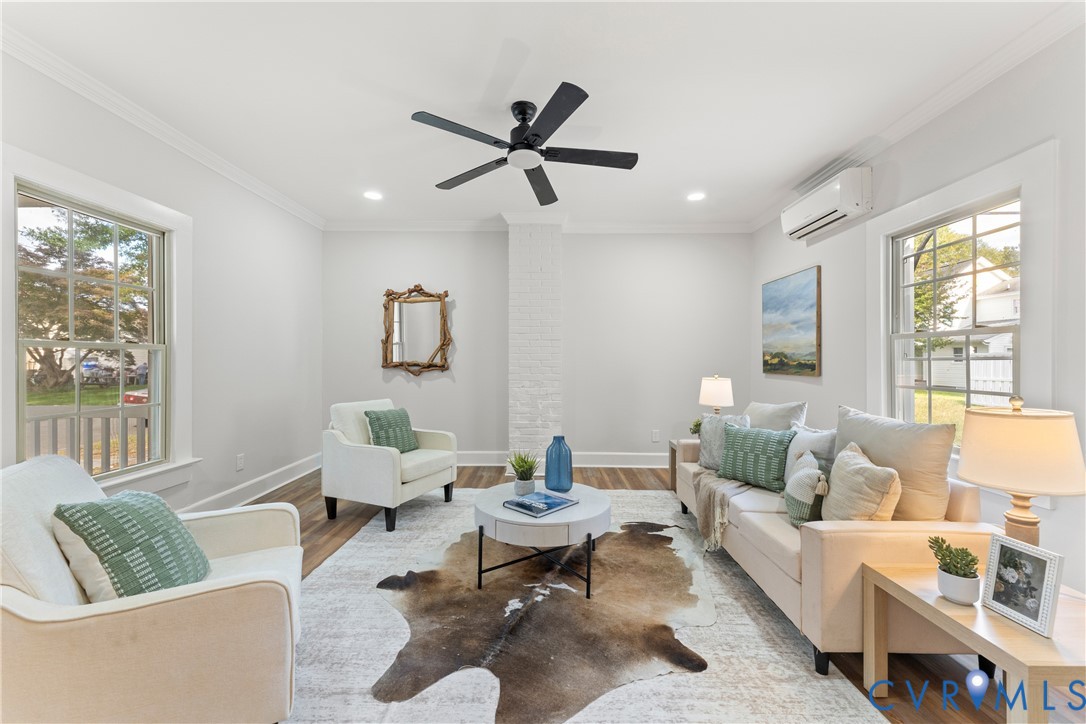 428 3rd Street West Point, VA 23181 - Photo 7 of 49 a living room with furniture and a window