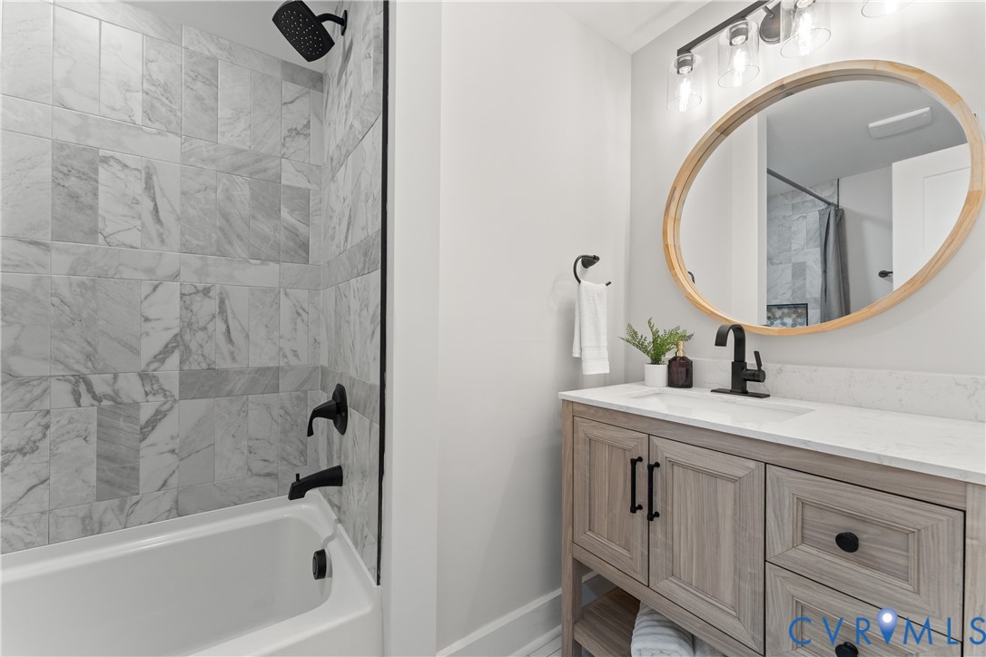 428 3rd Street West Point, VA 23181 - Photo 10 of 49 a bathroom with a sink and a mirror