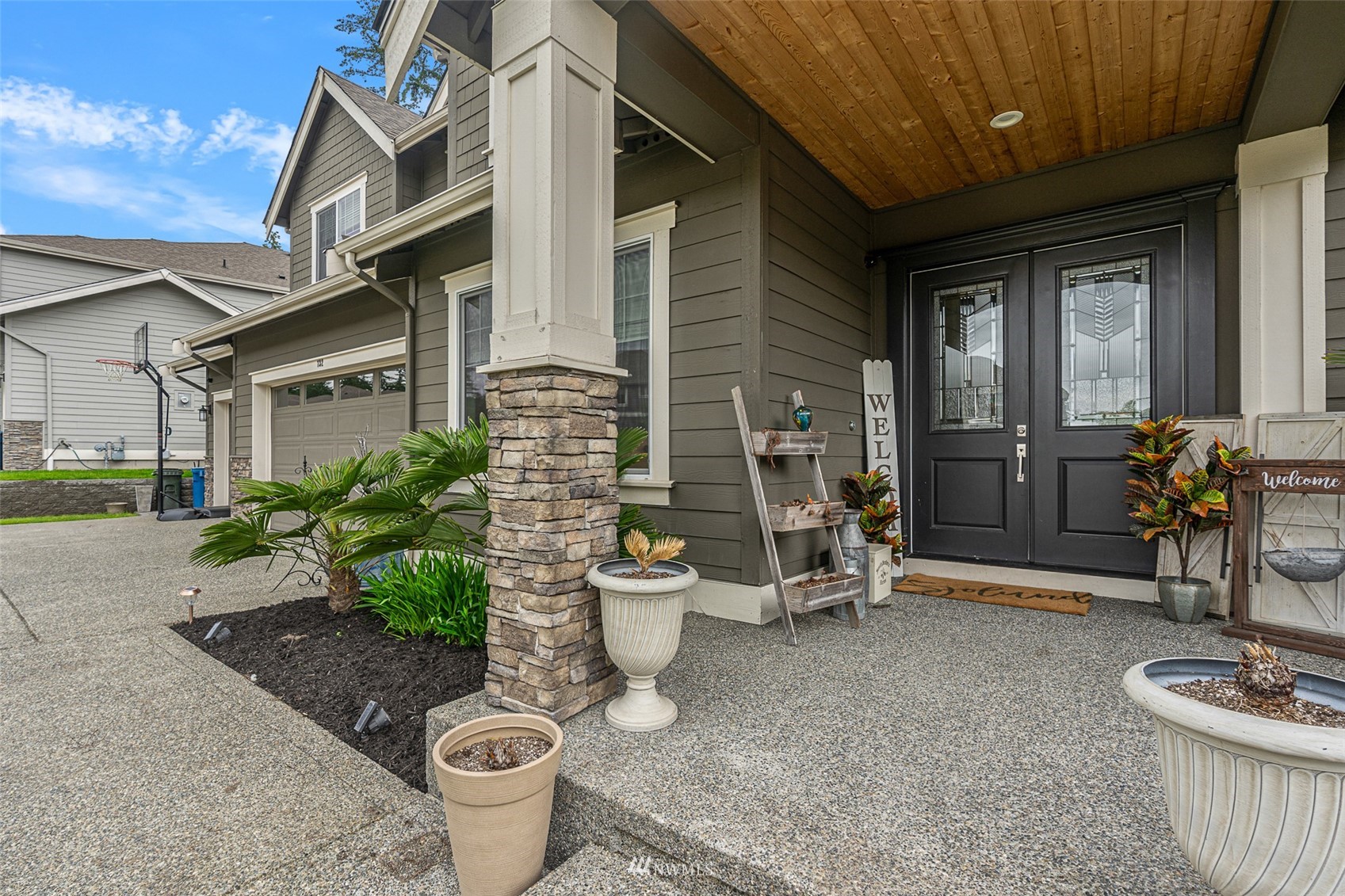 732 Wapato Place Southeast Renton, WA 98059 - Photo 3 of 40 a view of a patio with chair and potted plants