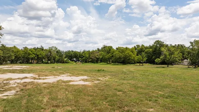 a view of a water fountain and an outdoor space