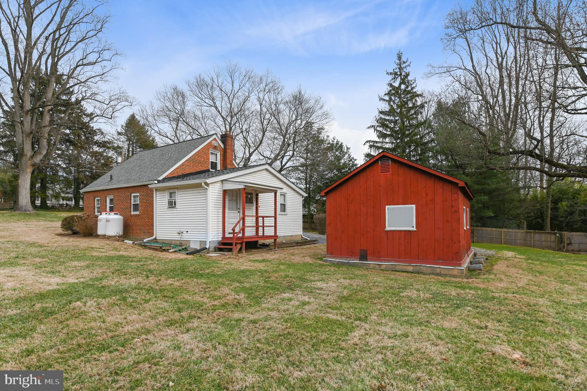 11418 Mapleview Drive Silver Spring, MD 20902 - Photo 32 of 44 a front view of house with yard and trees