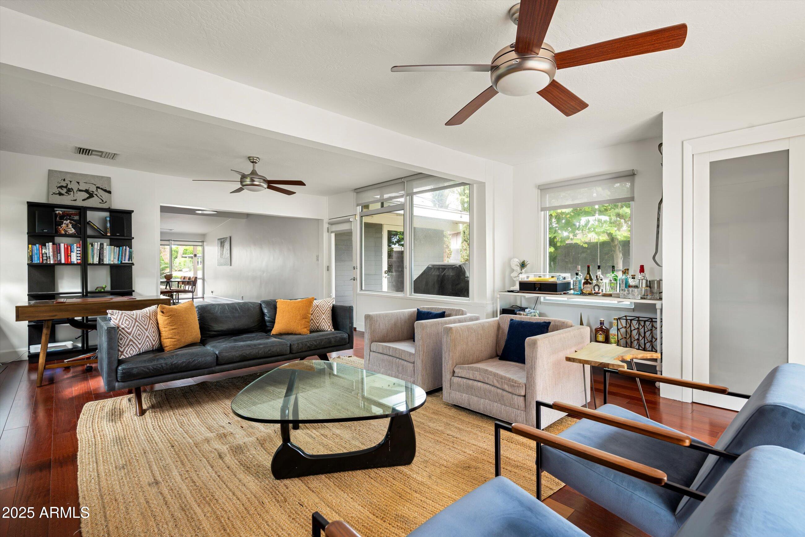 1651 East Rovey Avenue Phoenix, AZ 85016 - Photo 12 of 44 a living room with furniture a rug and a window