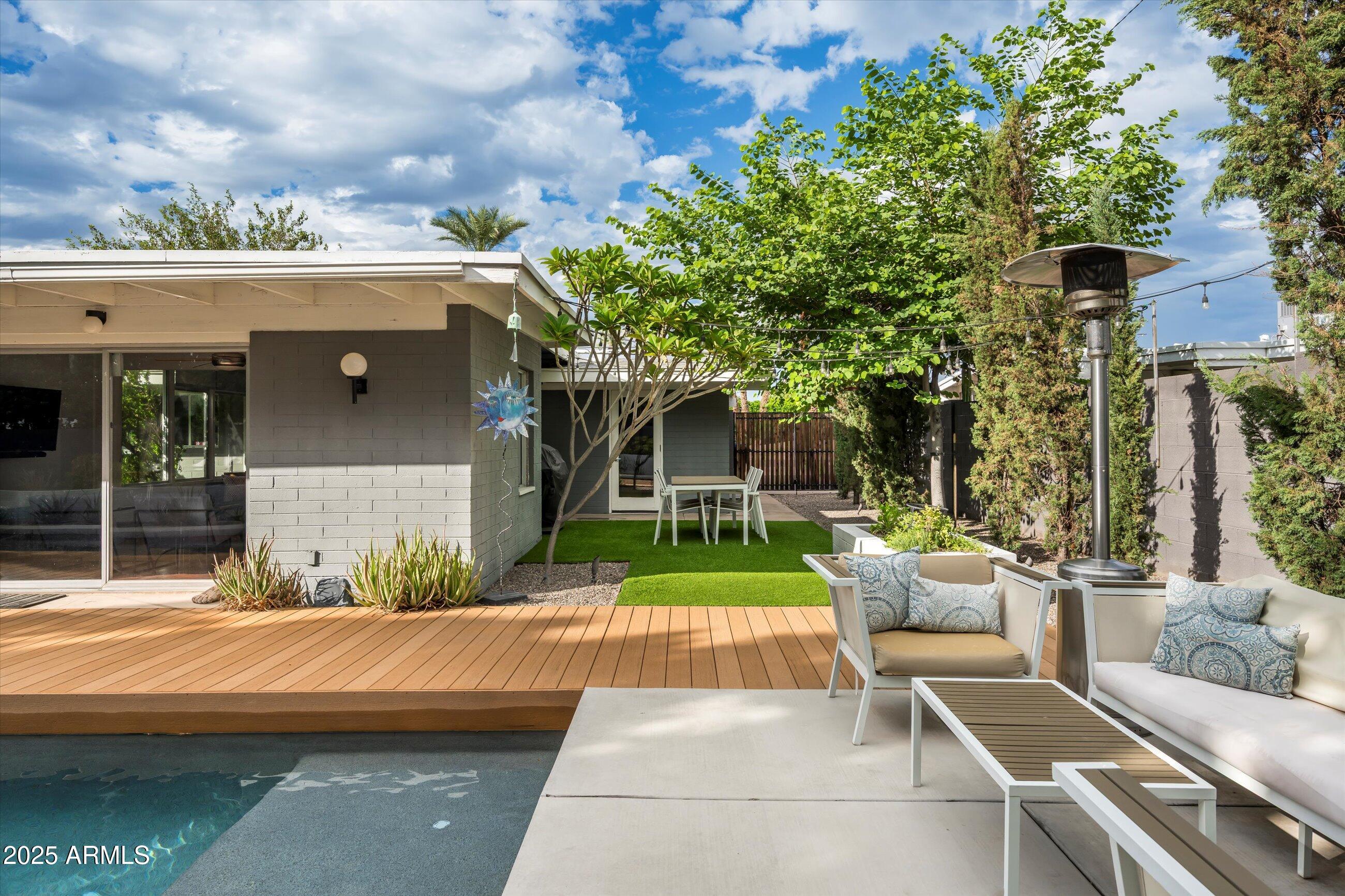 1651 East Rovey Avenue Phoenix, AZ 85016 - Photo 3 of 44 a view of a house with a patio