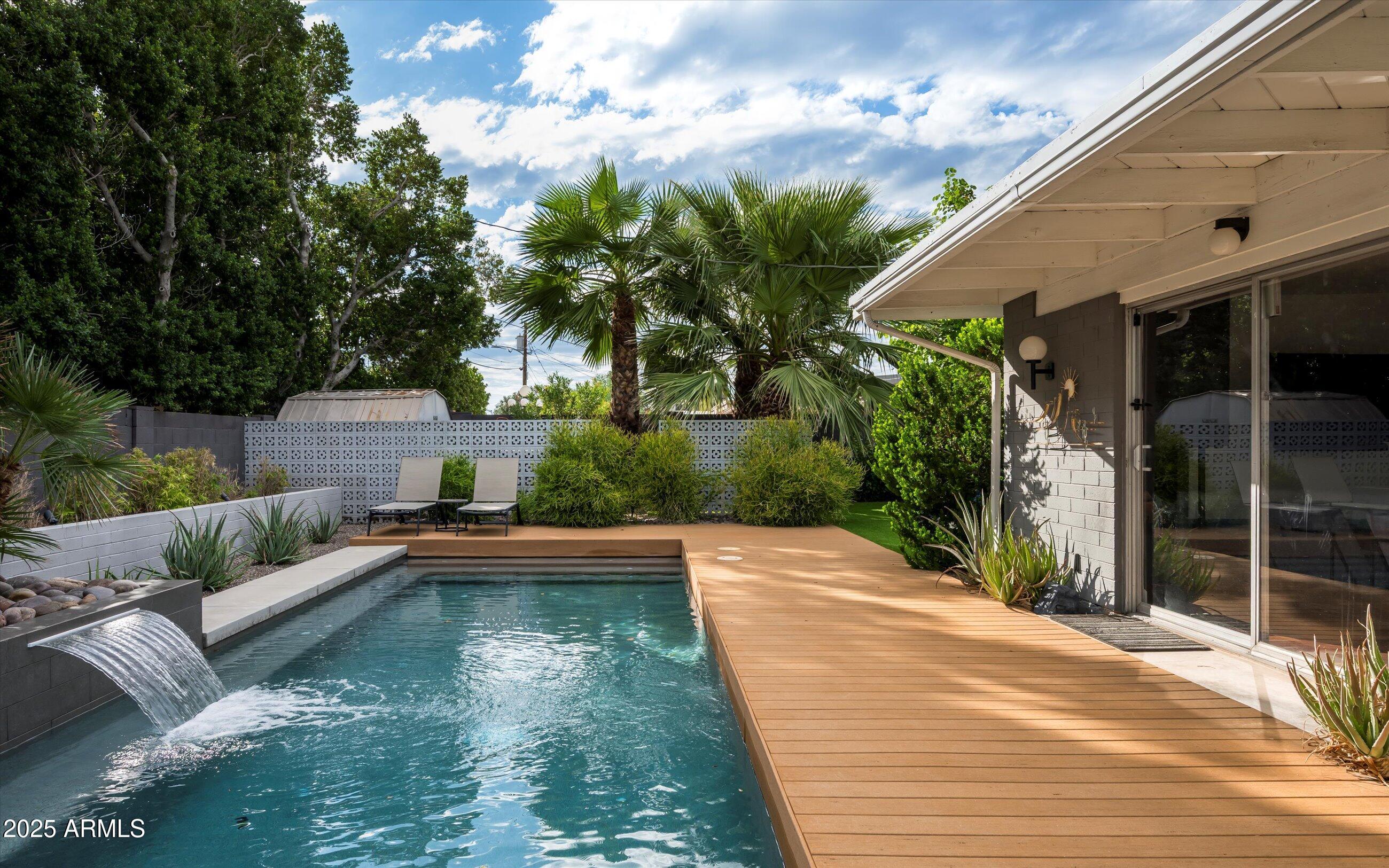 1651 East Rovey Avenue Phoenix, AZ 85016 - Photo 32 of 44 a view of swimming pool with patio