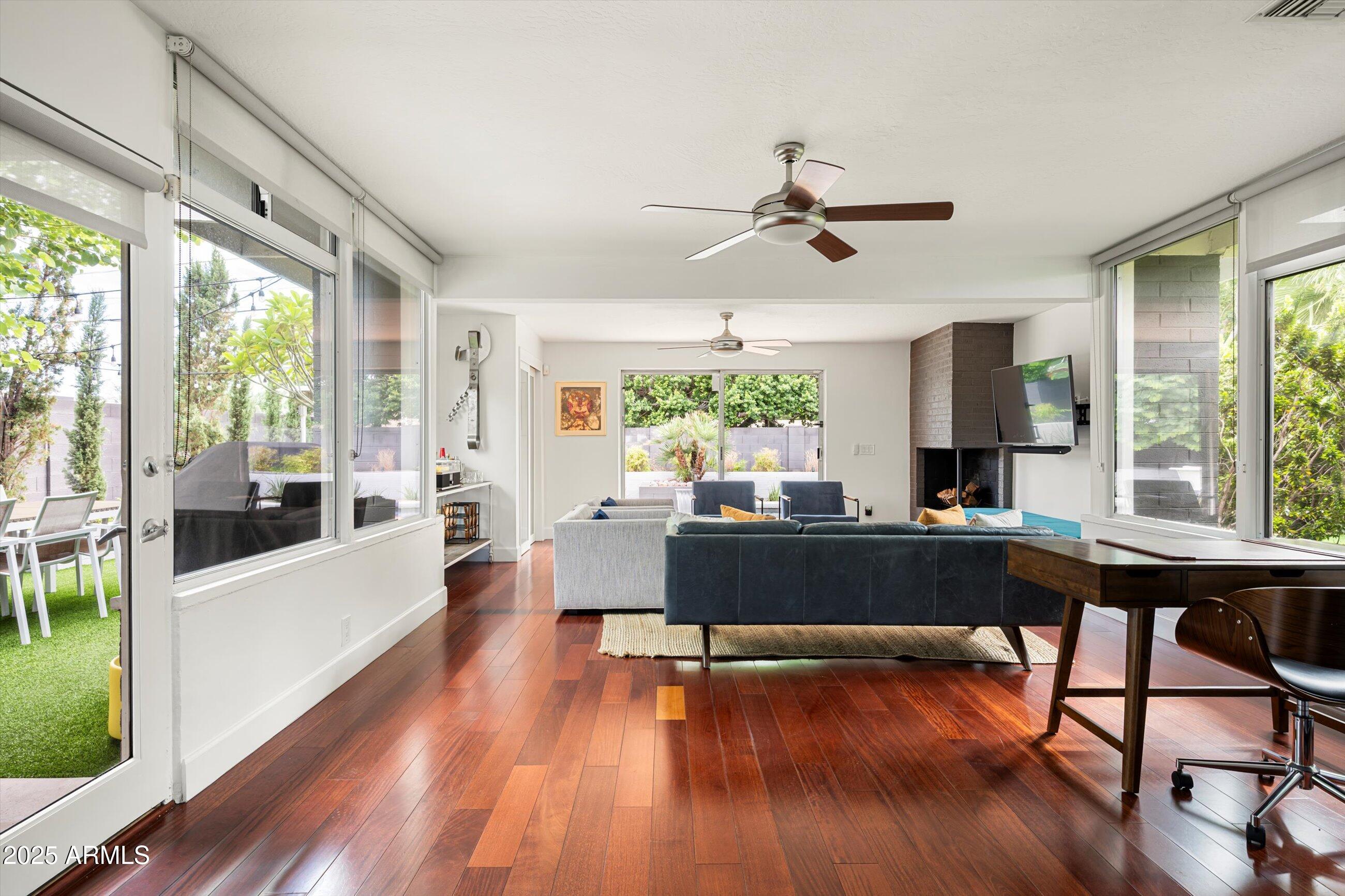 1651 East Rovey Avenue Phoenix, AZ 85016 - Photo 9 of 44 a living room with furniture and a large window