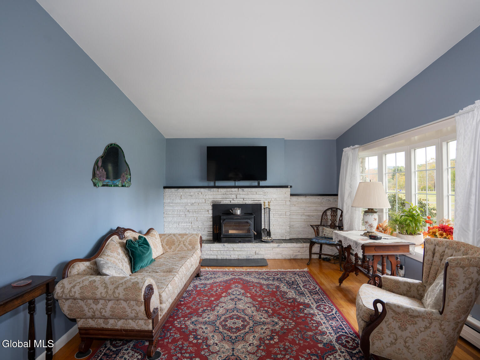 653 Brunswick Road Brunswick, NY 12180 - Photo 7 of 37 Living Room with Wood Burning Fireplace