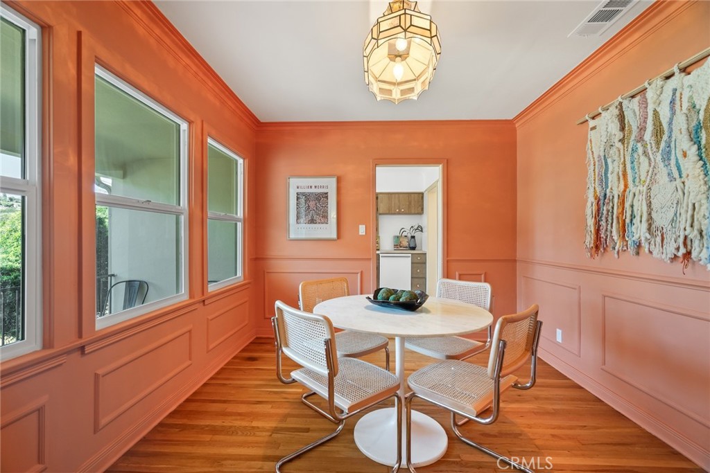 3912 York Boulevard Los Angeles, CA 90065 - Photo 11 of 51 a dining room with furniture and wooden floor
