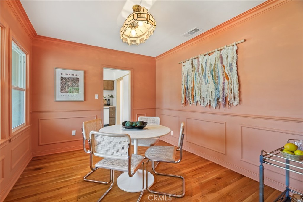 3912 York Boulevard Los Angeles, CA 90065 - Photo 14 of 51 a dining room with furniture and wooden floor