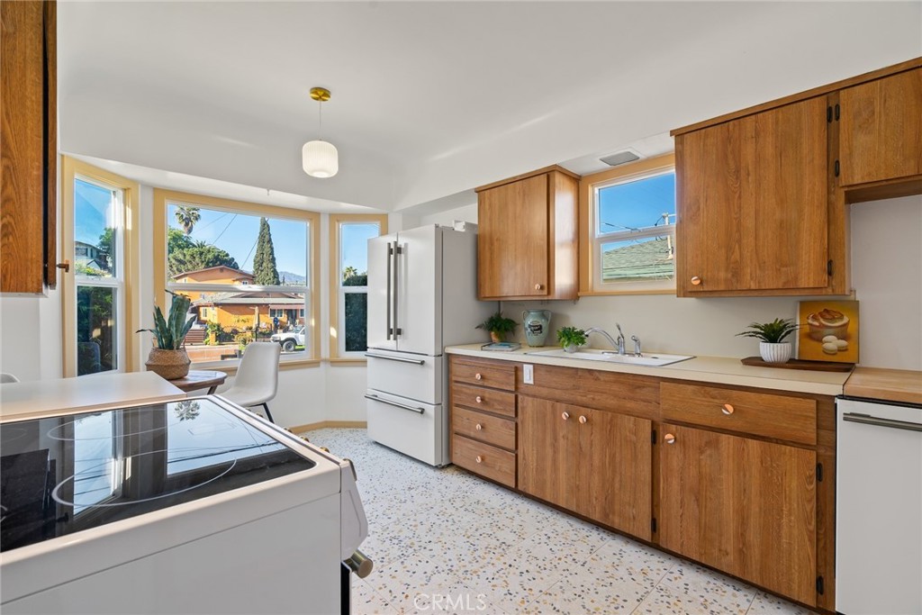 3912 York Boulevard Los Angeles, CA 90065 - Photo 15 of 51 a kitchen with sink and cabinets