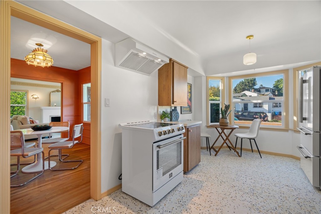 3912 York Boulevard Los Angeles, CA 90065 - Photo 16 of 51 a view of a livingroom with furniture cabinet and front view of a house
