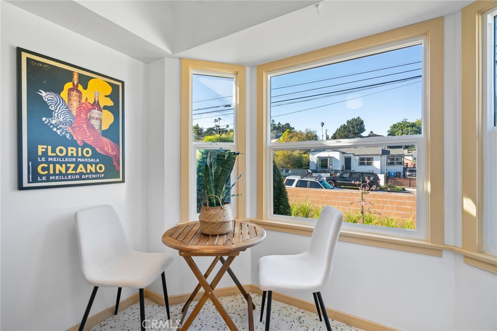3912 York Boulevard Los Angeles, CA 90065 - Photo 18 of 51 a view of a dining room with furniture a livingroom and outdoor view