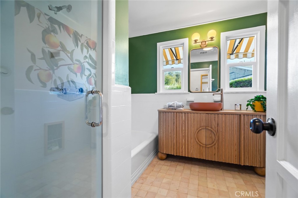 3912 York Boulevard Los Angeles, CA 90065 - Photo 24 of 51 a bathroom with a tub and shower