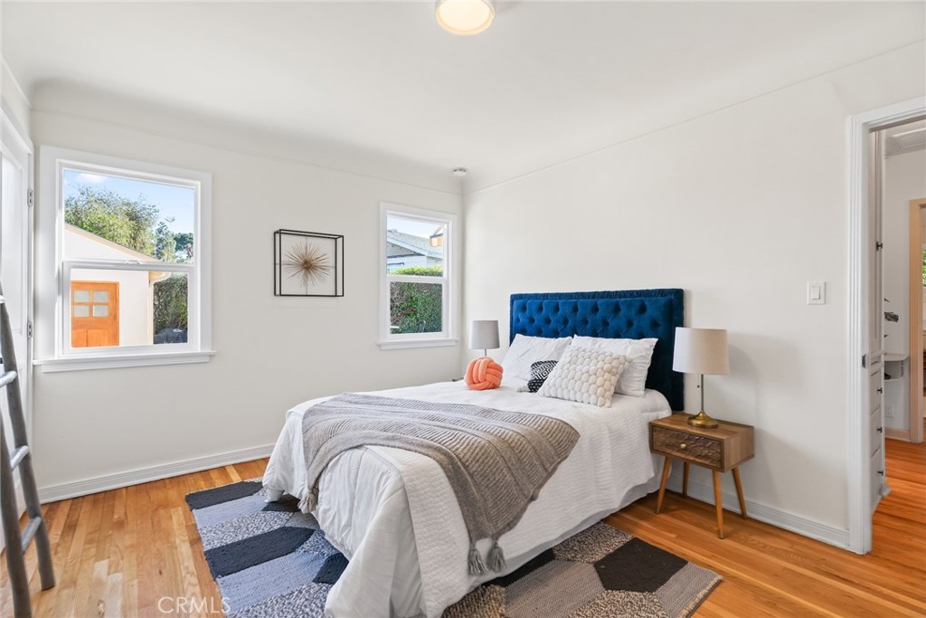 3912 York Boulevard Los Angeles, CA 90065 - Photo 25 of 51 a bedroom with a bed and a window