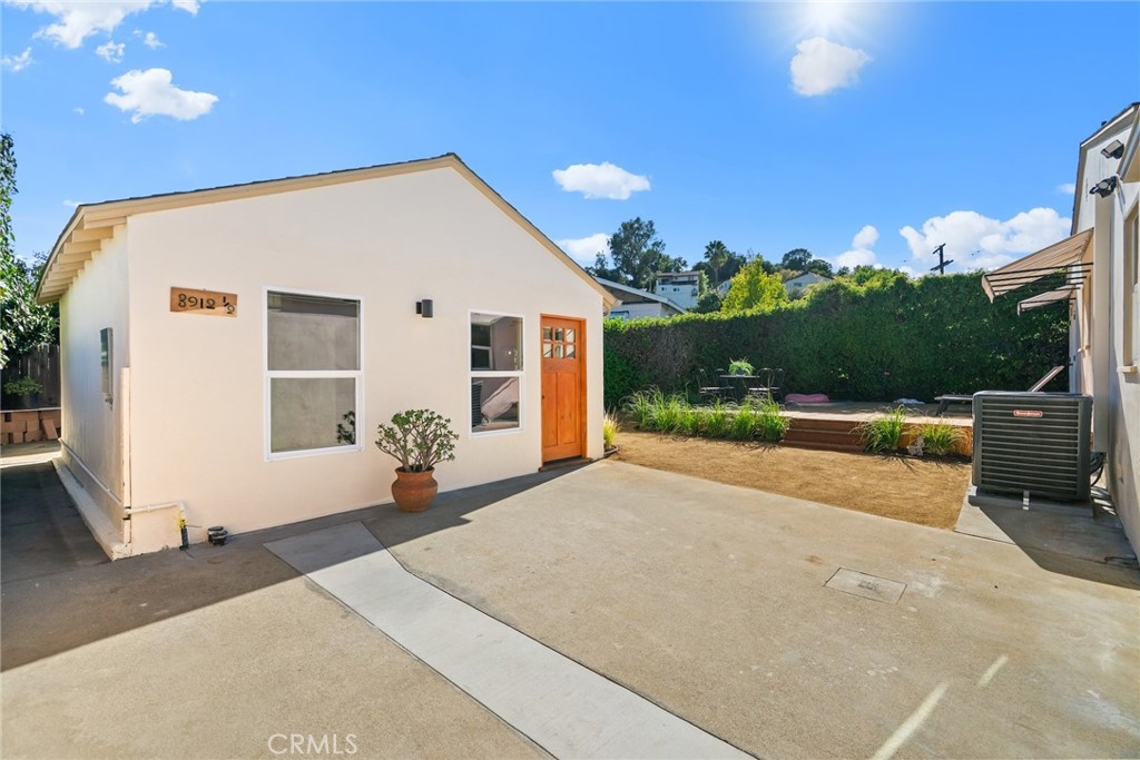 3912 York Boulevard Los Angeles, CA 90065 - Photo 37 of 51 a view of a house with backyard and a garage