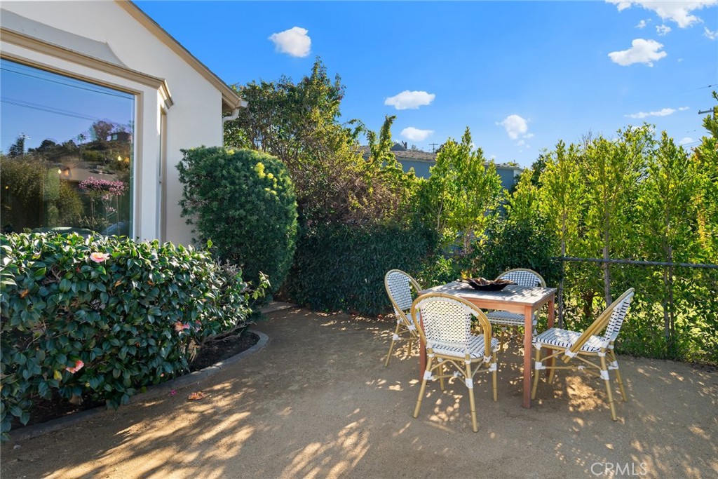 3912 York Boulevard Los Angeles, CA 90065 - Photo 4 of 51 a view of a chairs and table in a backyard