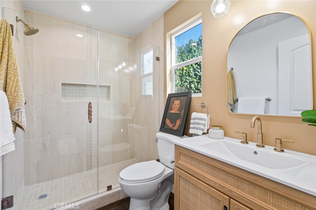 3912 York Boulevard Los Angeles, CA 90065 - Photo 45 of 51 a bathroom with a sink a toilet and shower