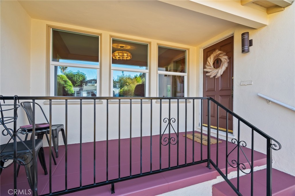 3912 York Boulevard Los Angeles, CA 90065 - Photo 5 of 51 a view of a porch with wooden floor and furniture