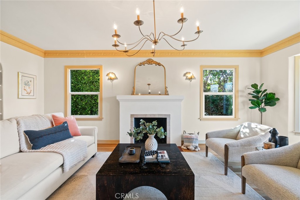 3912 York Boulevard Los Angeles, CA 90065 - Photo 6 of 51 a living room with furniture fireplace and a large window