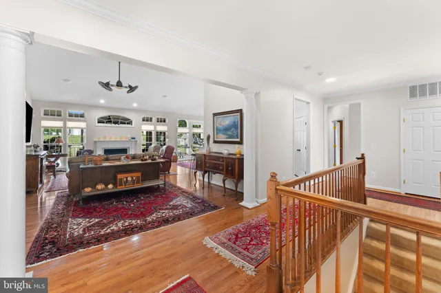 a living room with furniture and a rug