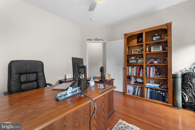 a room with furniture and book shelf