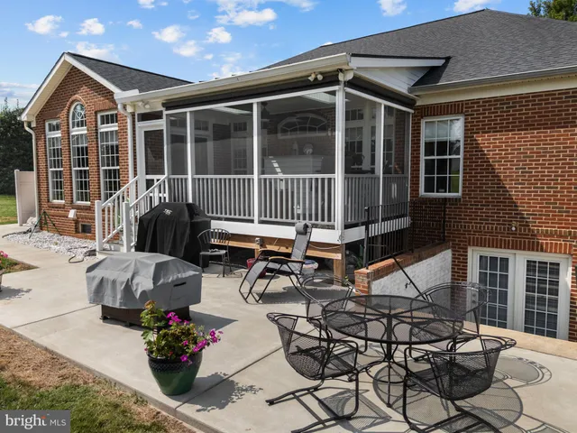 a front view of a house with patio