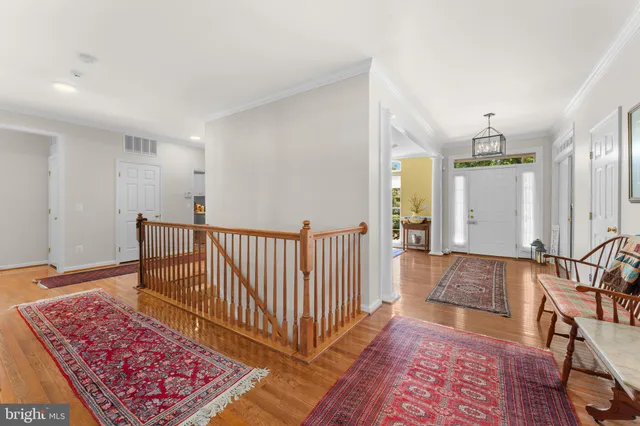 a view of entryway with wooden floor