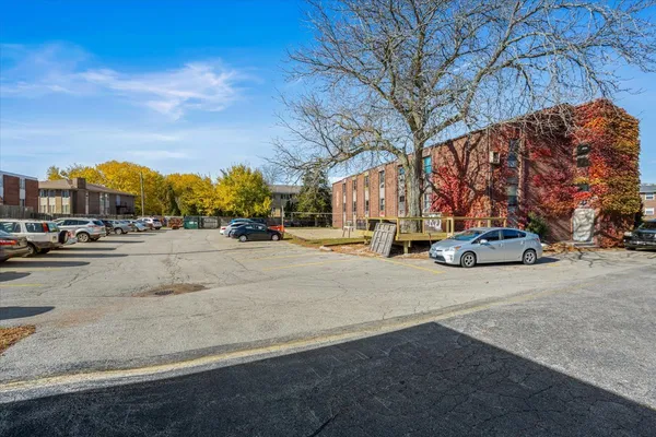 a view of a backyard with sitting area