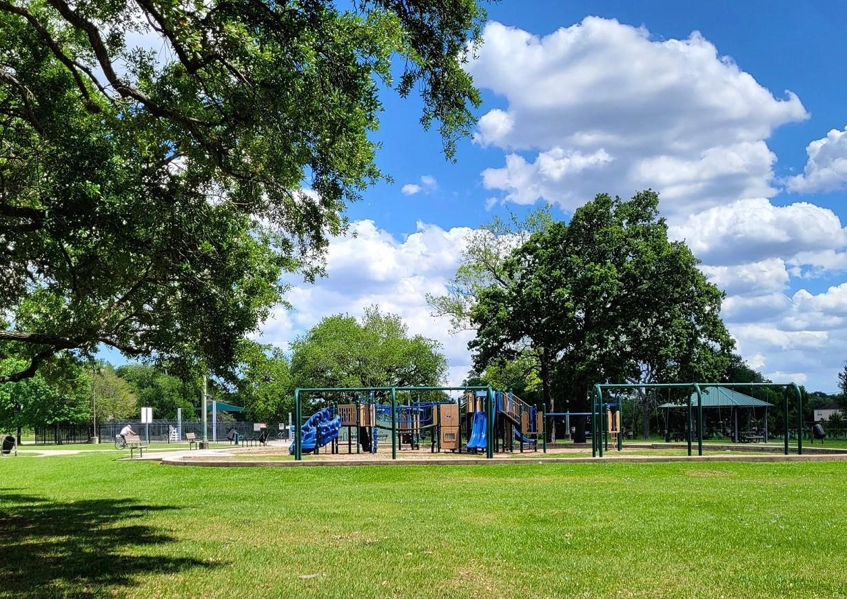 7543 Greenstone Street Houston, TX 77087 - Photo 23 of 24 a view of building with trees in the background