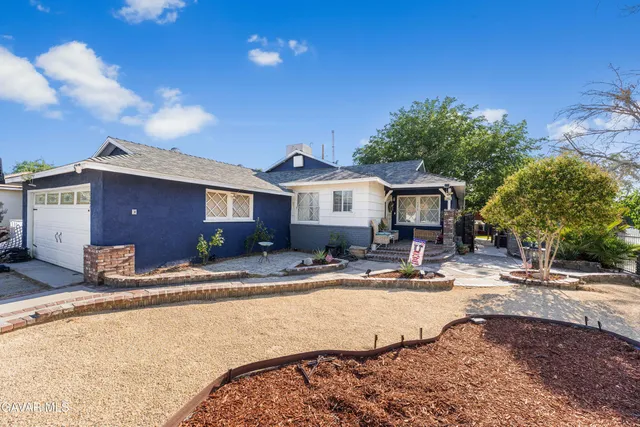 a view of a house with sitting area