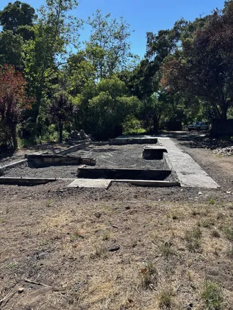 a view of backyard with green space