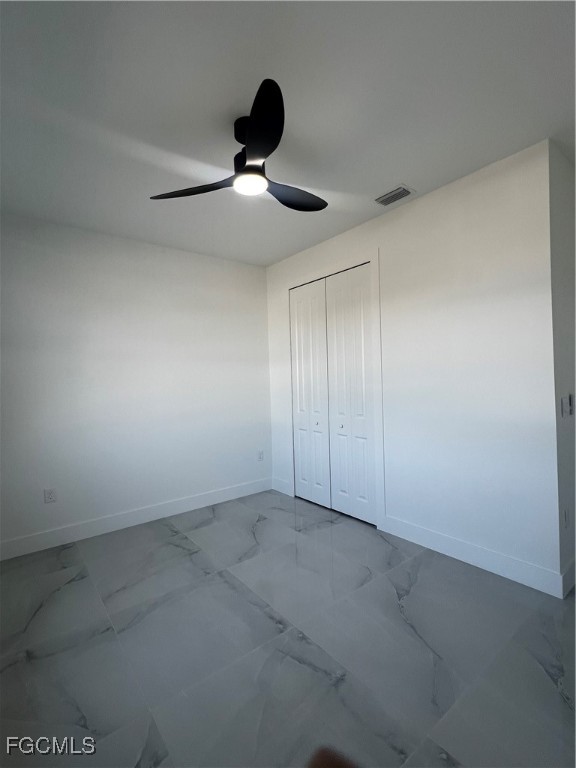 2511 30th Street Southwest Lehigh Acres, FL 33976 - Photo 11 of 15 a view of an empty room and window