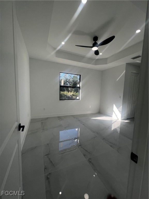 2511 30th Street Southwest Lehigh Acres, FL 33976 - Photo 9 of 15 a bathroom with a window and a shower